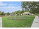 Well-maintained recreation area including a putting green, pool, and clubhouse at 18108 Ashton Park Way, Tampa, FL 33647