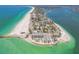 Island condo featuring a pool, sandy beach, and sparkling blue-green ocean views at 200 1St Ave # 406, St Pete Beach, FL 33706