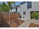 Cozy backyard with a barbecue grill and a small sitting area at 2011 S Carolina Ave, Tampa, FL 33629