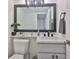Well-maintained powder room boasts modern fixtures, stylish sink, and convenient toilet at 2011 S Carolina Ave, Tampa, FL 33629
