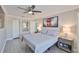 Well-lit bedroom with a ceiling fan and modern decor create a relaxing retreat at 2011 S Carolina Ave, Tampa, FL 33629