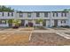 Charming townhouse featuring a landscaped yard at 2011 S Carolina Ave, Tampa, FL 33629