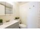 Bathroom featuring a light-colored vanity and a shower with a curtain at 210 Cypress Ct # 122, Oldsmar, FL 34677