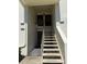 Close up of the entrance to unit 210, 212 with stairs at 210 Cypress Ct # 122, Oldsmar, FL 34677