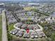 An aerial view of a charming community surrounded by lakes and lush landscaping at 215 Sela Cove Cir, Apollo Beach, FL 33572