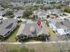 Overhead view of the light yellow home showcasing its well-maintained landscaping and community setting at 215 Sela Cove Cir, Apollo Beach, FL 33572