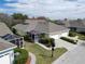 Lovely single-story home featuring an enclosed lanai and a well-manicured front yard at 215 Sela Cove Cir, Apollo Beach, FL 33572