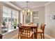 Bright breakfast nook with natural light and comfortable seating at 215 Sela Cove Cir, Apollo Beach, FL 33572