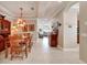 Open concept: Dining room flows into living spaces, perfect for entertaining at 215 Sela Cove Cir, Apollo Beach, FL 33572