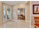 Inviting foyer with tile flooring, leading to a bright living space at 215 Sela Cove Cir, Apollo Beach, FL 33572