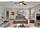 Inviting living room with comfortable seating and a view of the outdoor patio at 215 Sela Cove Cir, Apollo Beach, FL 33572