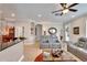 Comfortable living area with stylish decor open to dining and kitchen areas at 215 Sela Cove Cir, Apollo Beach, FL 33572