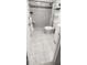 Bright bathroom with a walk-in shower, fresh white tiles, and a clean design, providing a refreshing and comfortable space at 2261 Swedish Dr # 59, Clearwater, FL 33763
