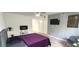 Inviting bedroom with a cozy fireplace, modern decor, and a serene atmosphere, perfect for relaxation and comfort at 2261 Swedish Dr # 59, Clearwater, FL 33763