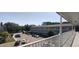 Balcony view of the condo complex showing the parking lot and building exterior at 2261 Swedish Dr # 59, Clearwater, FL 33763