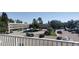 A view of the condominiums from a balcony with a view of the parking area at 2261 Swedish Dr # 59, Clearwater, FL 33763