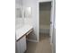 Bathroom featuring a vanity with white countertop and a shower-tub combination at 24741 Ravello St, Land O Lakes, FL 34639