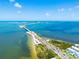 Scenic aerial view featuring bridge and water with views of nearby beaches at 2530 Gary Cir # 301, Dunedin, FL 34698