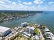 This aerial view reveals the community's location near the water and its lush surrounding, creating a serene environment at 2530 Gary Cir # 301, Dunedin, FL 34698