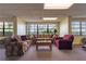 Cozy lounge featuring comfortable seating, a window with an outdoor view and relaxing atmosphere for residents and guests at 2530 Gary Cir # 301, Dunedin, FL 34698