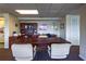 Well-lit community office space featuring a large desk and lots of storage for conducting day-to-day administration at 2530 Gary Cir # 301, Dunedin, FL 34698