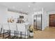 Modern kitchen featuring white cabinets, stainless steel appliances, and a breakfast bar at 3041 Waterfall Dr, Spring Hill, FL 34608