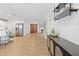 Spacious living space with wood-look floors, open layout, and stylish décor at 3041 Waterfall Dr, Spring Hill, FL 34608