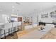 Open-concept living space with modern kitchen, dining area, and seating at 3041 Waterfall Dr, Spring Hill, FL 34608