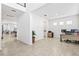 Open-concept home office with views and ample workspace, perfect for productivity at 3071 Marine Grass Dr, Wimauma, FL 33598