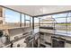 Well-equipped outdoor kitchen featuring stainless steel grill, storage, and beautiful water views at 3071 Marine Grass Dr, Wimauma, FL 33598