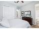 A tranquil bedroom features a comfortable queen bed, closet space, and an en-suite bathroom at 31510 Cabana Rye Ave, San Antonio, FL 33576