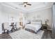 Tranquil bedroom features tray ceilings and stylish decor at 31510 Cabana Rye Ave, San Antonio, FL 33576