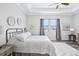 Beautiful bedroom with tray ceilings, carpet, and plenty of natural light at 31510 Cabana Rye Ave, San Antonio, FL 33576