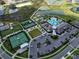 A breathtaking aerial view featuring tennis courts, the community pool, and the recreation center at 31510 Cabana Rye Ave, San Antonio, FL 33576
