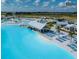 The community features a large resort style pool with beach entry, lounge chairs and a covered bar and grill area at 31510 Cabana Rye Ave, San Antonio, FL 33576