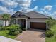 Charming single-Gathering home with a well-manicured lawn and a brick-paved driveway at 31510 Cabana Rye Ave, San Antonio, FL 33576
