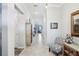 Hallway showcasing neutral colors and decorative accents, connecting various rooms in the home at 31510 Cabana Rye Ave, San Antonio, FL 33576
