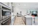 Kitchen featuring stainless steel appliances, sleek countertops, and ample cabinet space at 31510 Cabana Rye Ave, San Antonio, FL 33576