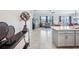 Open floor plan with kitchen featuring an island, stainless steel appliances, and modern finishes at 31510 Cabana Rye Ave, San Antonio, FL 33576