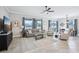 Cozy living room with modern furniture, neutral colors, and lots of natural light at 31510 Cabana Rye Ave, San Antonio, FL 33576