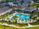 Aerial perspective capturing the expansive pool area, poolside seating, and the overall recreational space at 31510 Cabana Rye Ave, San Antonio, FL 33576