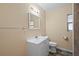 This bathroom provides a single sink and toilet, and a standard size mirror at 3303 W Ballast Point Blvd, Tampa, FL 33611