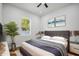 Cozy bedroom with soft lighting, stylish decor, and a comfortable bed with plush pillows at 331 Archimedes St, Dunedin, FL 34698