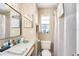 Full bathroom with neutral tones, a vanity and shower and tub combo with a shower curtain at 3343 Fox Hunt Dr, Palm Harbor, FL 34683