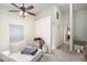 Spacious bedroom with high ceilings, neutral carpet, and plenty of natural light at 3343 Fox Hunt Dr, Palm Harbor, FL 34683