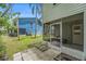 Outdoor screened lanai offering a comfortable space for enjoying the outdoors and natural light at 3343 Fox Hunt Dr, Palm Harbor, FL 34683