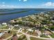 Waterfront homes feature access to the Gulf and verdant tropical landscaping at 3420 Santa Clara Dr, Punta Gorda, FL 33983
