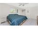Bright bedroom with a queen bed, ceiling fan, and view from the window at 3420 Santa Clara Dr, Punta Gorda, FL 33983
