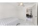 Bedroom with tile floor, ceiling fan and view to dining room at 3420 Santa Clara Dr, Punta Gorda, FL 33983