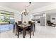 Dining room adjacent to kitchen and overlooking a patio area at 3420 Santa Clara Dr, Punta Gorda, FL 33983